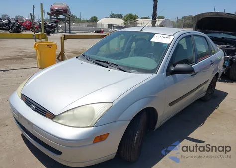 2001 Ford Focus Lx z USA, uszkodzony, nr VIN 1FAFP33P31W327982